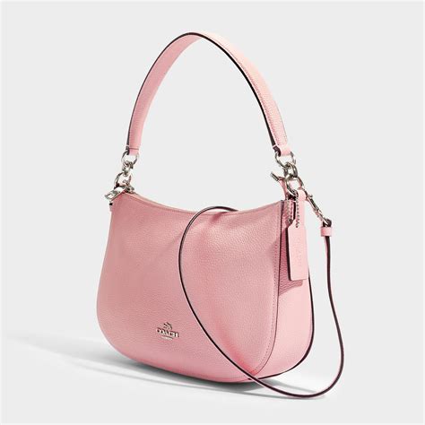 pink crossbody coach bag.